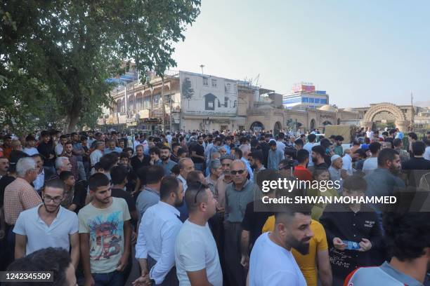 People gather for a rally called for by the New Generation Movement, a Kurdish opposition party, in Iraq's northeastern city of Sulaimaniyah in the...