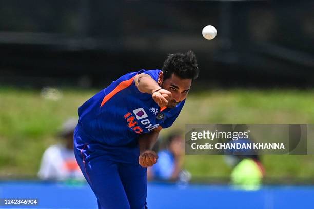 Bhuvneshwar Kumar, of India, bowls during the fourth T20I match between West Indies and India at the Central Broward Regional Park in Lauderhill,...
