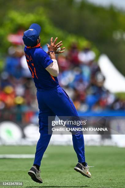 Deepak Hooda, of India, takes a catch to dismiss Devon Thomas, of West Indies, during the fourth T20I match between West Indies and India at the...