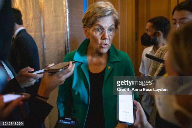 Sen. Elizabeth Warren speaks to reporters as she arrives at the Senate floor for a vote on Capitol Hill on August 6, 2022 in Washington, DC. The U.S....