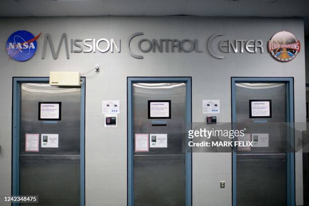 Sign reading "Mission Control Center" is displayed above doorways at the Johnson Space Centers Mission Control Center in Houston, Texas, on August 5,...