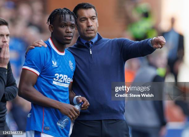 Giovanni van Bronckhorst Manager of Rangers with Rabbi Matondo during the Cinch Scottish Premiership match between Rangers FC and Kilmarnock FC at...