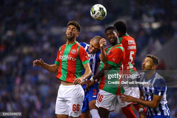 Kepler Lima 'Pepe' of FC Porto and Leo Andrade of CS Maritimo battle for the ball during the Liga Portugal Bwin match between FC Porto and CS...