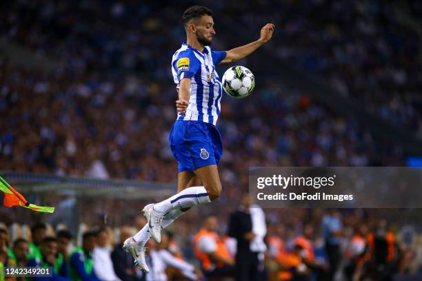 Joao Mario of FC Porto controls the ball during the Liga Portugal Bwin match between FC Porto and CS Maritimo at Estadio do Dragao on August 6, 2022...