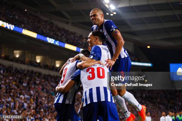 Evanilson of FC Porto celebrates with teammates after scoring his team's second goal during the Liga Portugal Bwin match between FC Porto and CS...