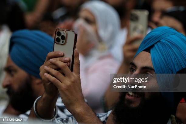 Boy clicks pictures with an iPhone in Srinagar Jammu and Kashmir India on 06 August 2022