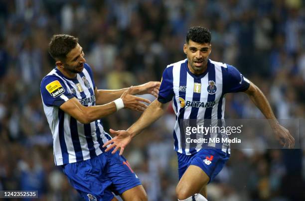 Mehdi Taremi of FC Porto celebrates with team mates Marko Gruji after scoring his 2nd Goal ,during the Liga Portugal Bwin match between FC Porto and...