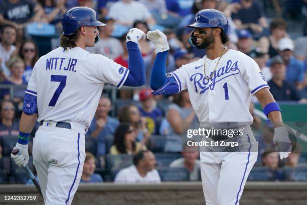 Melendez of the Kansas City Royals celebrates his home run with Bobby Witt Jr. #7 in the first inning against the Boston Red Sox at Kauffman Stadium...