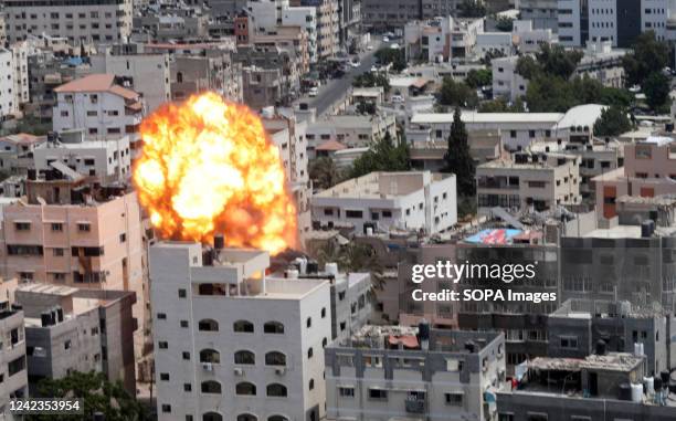 Fireball erupted due to an Israeli air strike on a building in Gaza City. At least 15 people died and 140 were injured, including a child, in a...