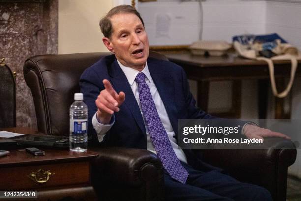 Sen. Ron Wyden speaks to members of the press in the Senate Press Gallery late in the evening on August 6, 2022. The U.S. Senate plans to work...