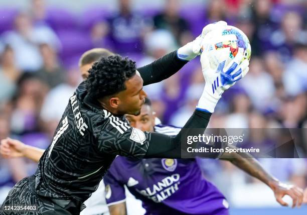 Orlando City goalkeeper Pedro Gallese makes a save during the MLS soccer match between the Orlando City SC and New England Revolution on August 6th,...