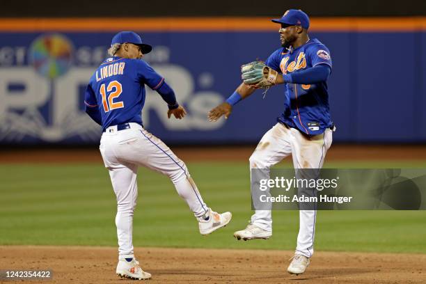 Francisco Lindor and Starling Marte of the New York Mets celebrate after defeating the Atlanta Braves in the second game of a doubleheader at Citi...