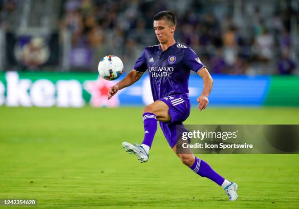 Orlando City defender João Moutinho receive a pass during the MLS soccer match between the Orlando City SC and New England Revolution on August 6th,...