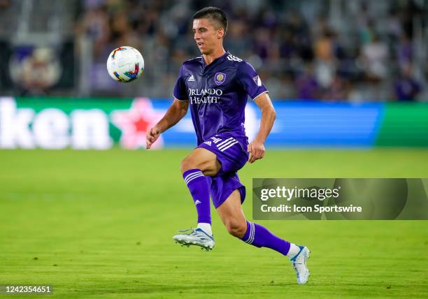 Orlando City defender João Moutinho receive a pass during the MLS soccer match between the Orlando City SC and New England Revolution on August 6th,...