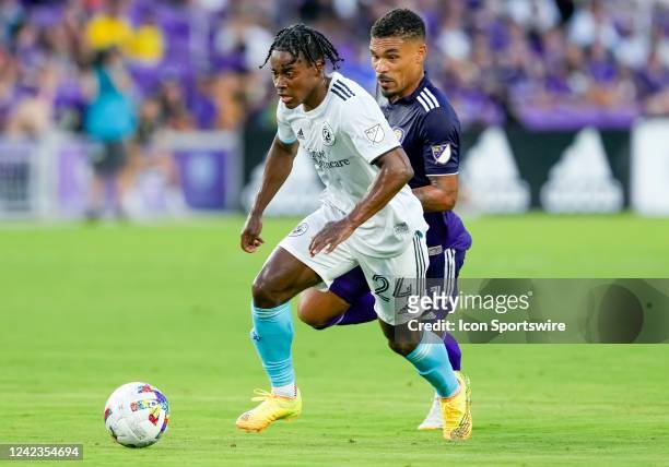 New England Revolution forward DeJuan Jones looks to shoot the ball during the MLS soccer match between the Orlando City SC and New England...