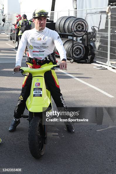 Charlie Devlin Racing Driver NTT IndyCar series driver Devlin DeFrancesco sits on his motor bike ...