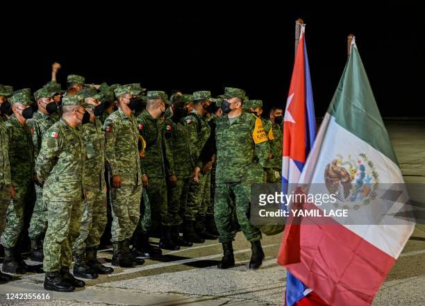 Members of the Mexican army arrive at Juan Gualberto Gomez International Airport in Matanzas Province, Cuba, August 6, 2022. - A Mexican Air Force...