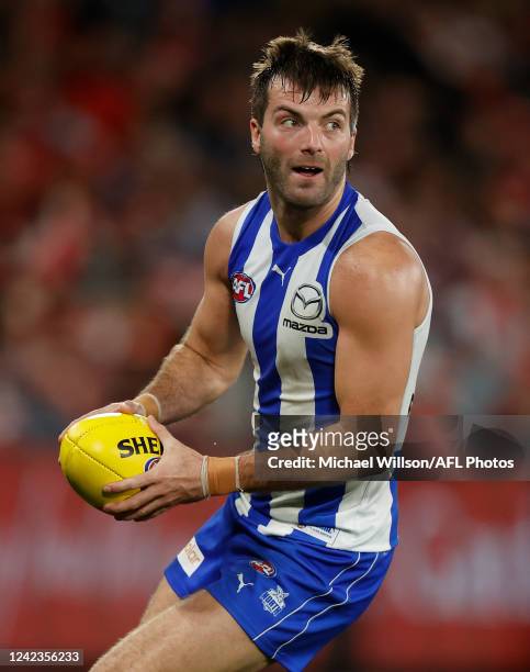Luke McDonald of the Kangaroos in action during the 2022 AFL Round 21 match between the North Melbourne Kangaroos and the Sydney Swans at Marvel...