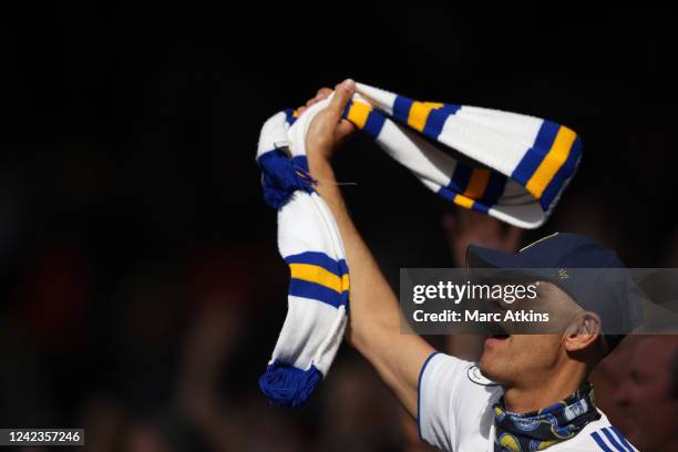 Leeds United fans waves a scarf during the Premier League match between Leeds United and Wolverhampton Wanderers at Elland Road on August 6, 2022 in...