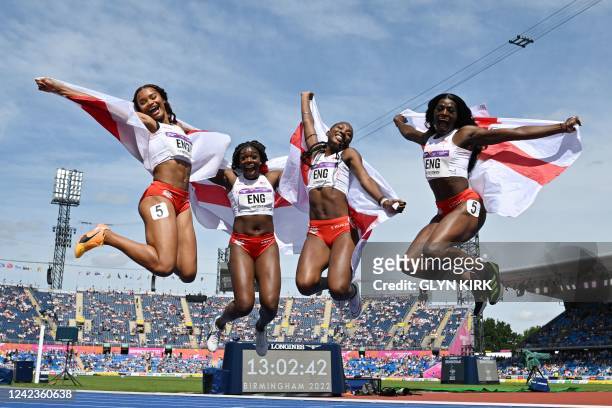 Silver medallists England's Asha Philip, England's Imani Lansiquot, England's Bianca Williams and England's Daryll Neita celebrate after the women's...