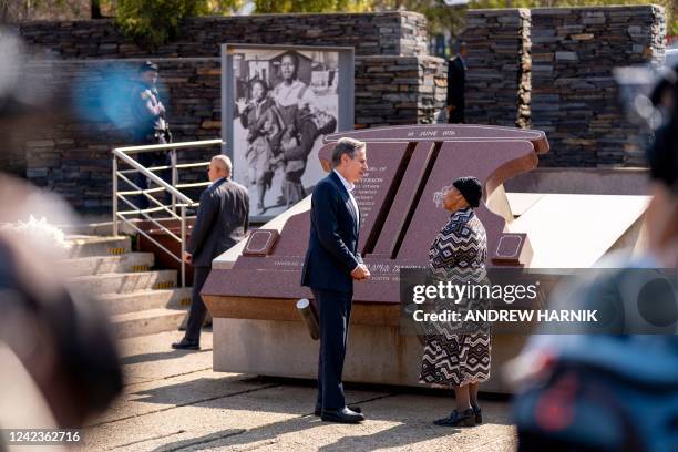 Secretary of State Antony Blinken greets Antoinette Sithole , the sister of the late Hector Pieterson, as he visits the Hector Pieterson Memorial in...