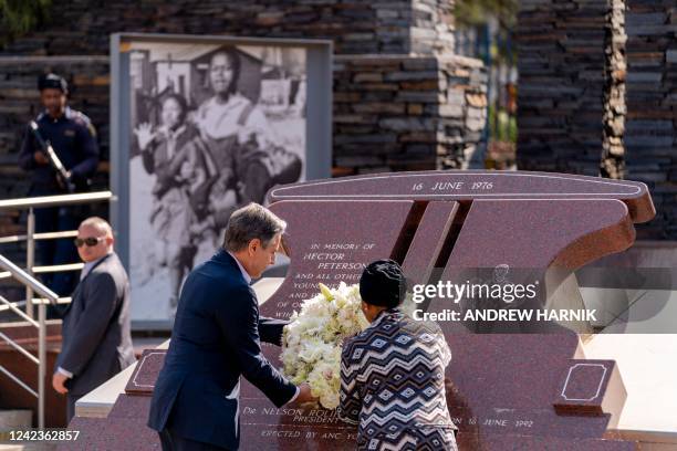 Secretary of State Antony Blinken and Antoinette Sithole , the sister of the late Hector Pieterson, right, lay a wreath at the Hector Pieterson...