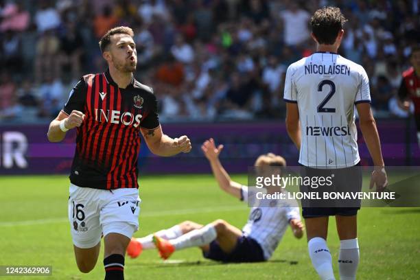 Nice's Welsh midfielder Aaron Ramsey celebrates scoring his team's first goal during the French L 1 football match between Toulouse FC and OGC Nice...