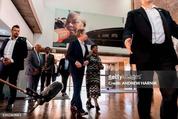 Secretary of State Antony Blinken and Antoinette Sithole , the sister of the late Hector Pieterson, tour the Hector Pieterson Memorial in Soweto,...