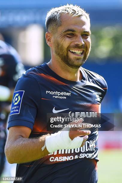 Montpellier's French midfielder Teji Savanier celebrates after scoring a goal during the French L1 football match between Montpellier Herault SC and...