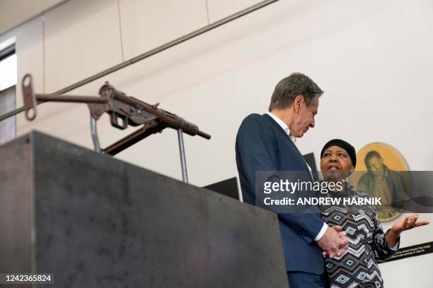 Secretary of State Antony Blinken speaks with Antoinette Sithole, the sister of late Hector Pieterson, killed during the Soweto uprising as he was...