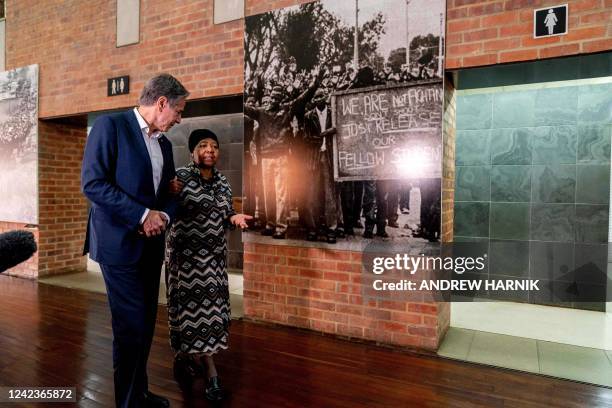 Secretary of State Antony Blinken speaks with Antoinette Sithole, the sister of late Hector Pieterson, killed during the Soweto uprising as he was...