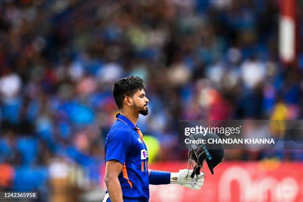 Shreyas Iyer, of India, walks back after getting dismissed during the fifth and final T20I match between West Indies and India at the Central Broward...