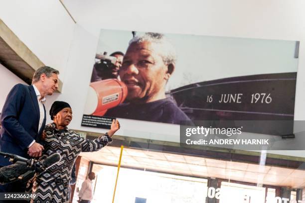 Secretary of State Antony Blinken speaks with Antoinette Sithole, the sister of late Hector Pieterson, killed during the Soweto uprising as he was...