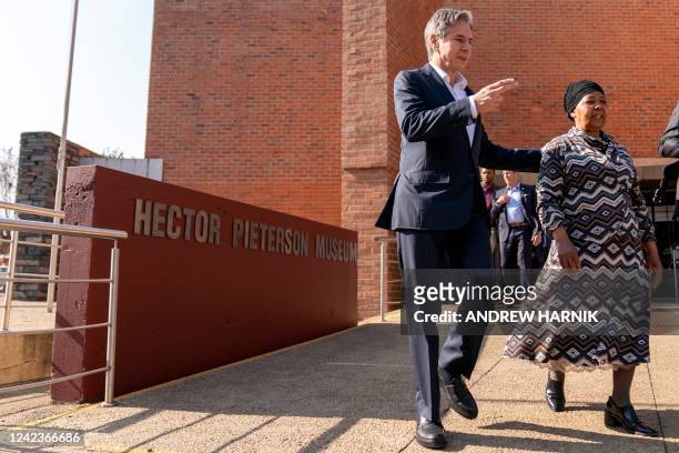 Secretary of State Antony Blinken speaks with Antoinette Sithole, the sister of late Hector Pieterson, killed during the Soweto uprising as he was...