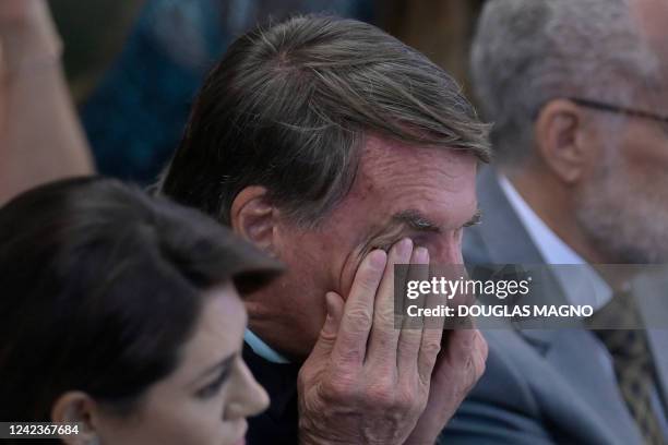 Brazil's President Jair Bolsonaro gestures during an evangelical event at the Baptist Church of Lagoinha in Belo Horizonte, Brazil, on August 7, 2022.