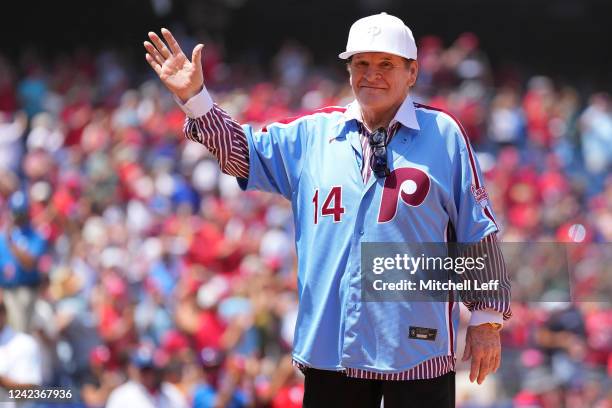 Former Philadelphia Phillies player Pete Rose acknowledges the crowd prior to the game against the Washington Nationals at Citizens Bank Park on...