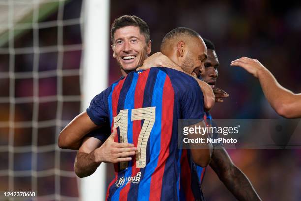 Pierre-Emerick Aubameyang of Barcelona celebrates with Robert Lewandowski after scoring his sides first goal during the Joan Gamper Trophy, friendly...