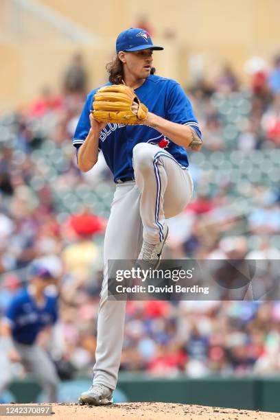 Kevin Gausman of the Toronto Blue Jays delivers a pitch against the Minnesota Twins in the first inning of the game at Target Field on August 7, 2022...