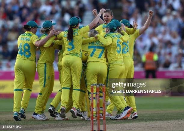 Australia celebrate winning the women's Twenty20 Cricket gold medal match between India and Australia on day ten of the Commonwealth Games at...