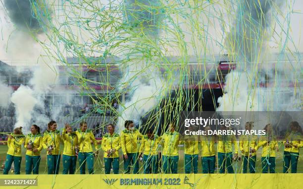 Gold medalists Australia stand on the podium during the medal ceremony for the women's Twenty20 Cricket on day ten of the Commonwealth Games at...