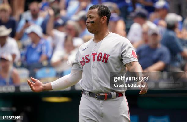 Rafael Devers of the Boston Red Sox reacts after lining out in the third inning against the Kansas City Royals at Kauffman Stadium on August 07, 2022...
