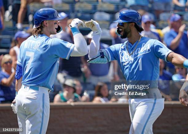 Melendez of the Kansas City Royals celebrates his three-run home run with Bobby Witt Jr. #7 in the fifth inning against the Boston Red Sox at...