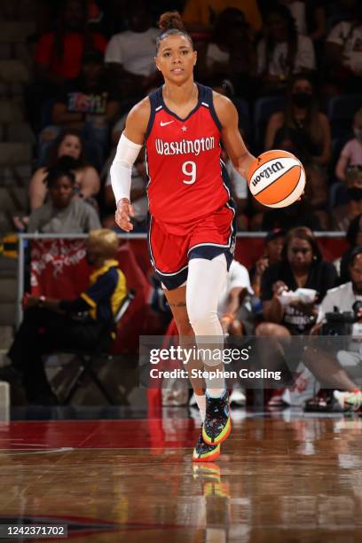 Natasha Cloud of the Washington Mystics dribbles the ball during the game against the Los Angeles Sparks on August 7, 2022 at Entertainment & Sports...