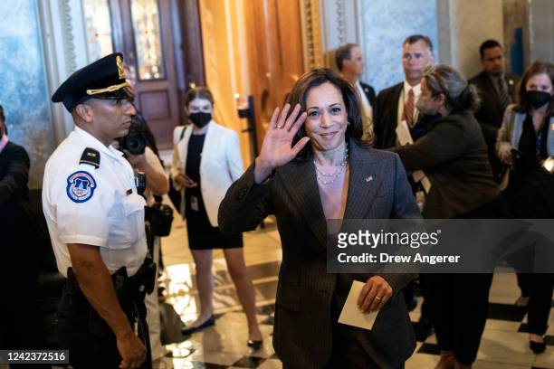 Vice President Kamala Harris waves as she departs the Senate after passage of the Inflation Reduction Act at the U.S. Capitol August 7, 2022 in...