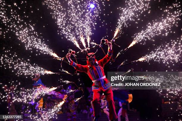 Members of the National Modern and Folkloric Ballet of Guatemala perform the traditional Mayan Q'eqchi' dance "El Paabanc" at the Miguel Angel...