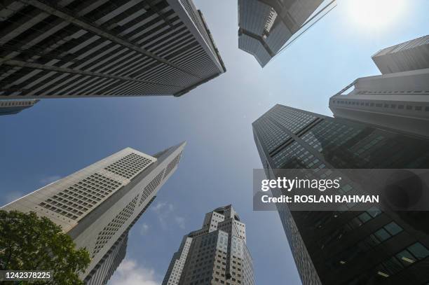 View of the highrise office buildings at the financial business district of Raffles Place in Singapore on August 8, 2022.