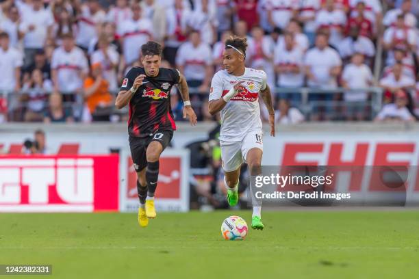 Dominik Szoboszlai of RB Leipzig and Juan Jose Perea of VfB Stuttgart battle for the ball during the Bundesliga match between VfB Stuttgart and RB...