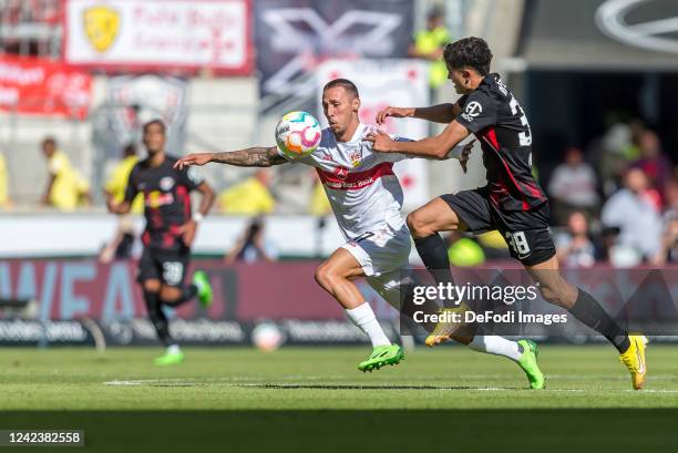 Darko Churlinov of VfB Stuttgart and Hugo Novoa Ramos of RB Leipzig battle for the ball during the Bundesliga match between VfB Stuttgart and RB...