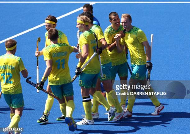 Australia's Jacob Anderson celebrates scoring the fifth goal during the men's gold medal hockey match between Australia and India on day eleven of...