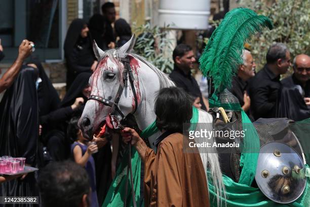 Reenactment is held on the day of Ashura during the month of Muharram on the Islamic calendar in Nushabad, Isfahan, Iran on August 08, 2022. Within...